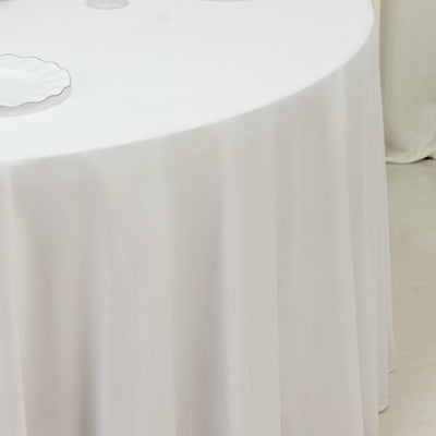 White round tablecloth on banquet table in room