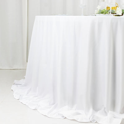 Elegant white tablecloth draped over a table for events or dining.