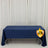 Navy blue tablecloth with logo on plain backdrop