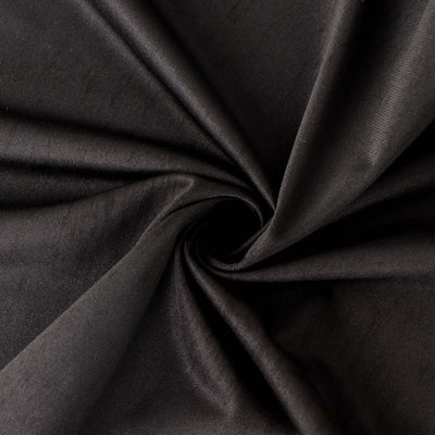 Black fabric with a smooth texture in a swirl pattern. #whtbkgd