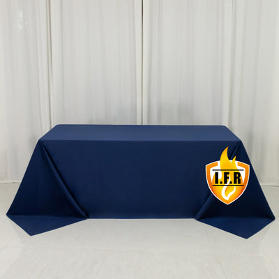 Navy tablecloth with logo on a plain backdrop