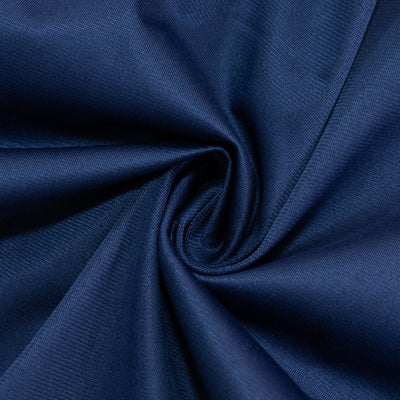 Navy blue fabric with a smooth, glossy texture in a swirling pattern. #whtbkgd