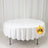 White round banquet table with floor-length tablecloth