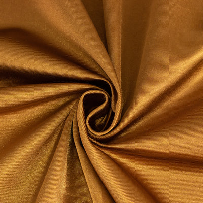 Gold satin fabric with a smooth, shiny texture.