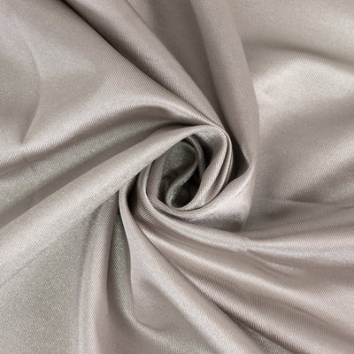 Silky taupe fabric with a smooth texture and subtle sheen.