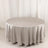 Round silver tablecloth on a plain background.