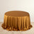 Round gold satin tablecloth with elegant draping.