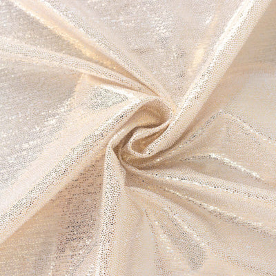 Gold shimmer fabric with sparkle texture, ideal for crafts and fashion design.