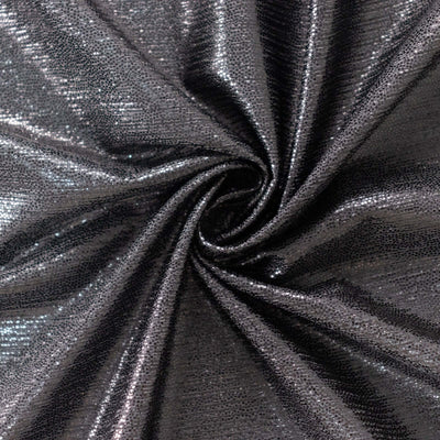 Shimmering black fabric with a textured finish, ideal for fashion and design.