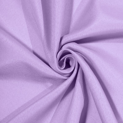Purple fabric in a spiral twist showcasing its texture and softness.