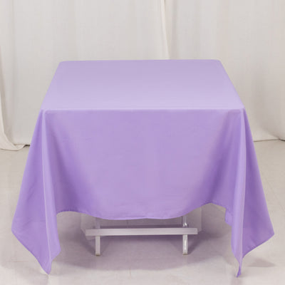 Purple tablecloth on a table with a soft background.