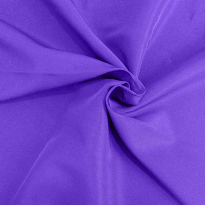 Purple fabric texture with smooth, flowing drapes.