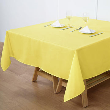 Enhance Your Table Setting with the Yellow Square Seamless Polyester Tablecloth 70"x70"