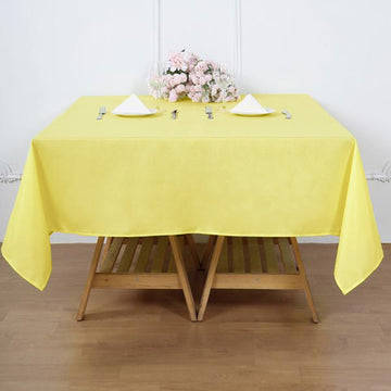 Add a Pop of Elegance with the Yellow Square Seamless Polyester Tablecloth 70"x70"