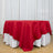 Red round tablecloth with white underlay on banquet table