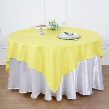 Add a Festive Touch with the Yellow Seamless Square Polyester Table Overlay 90"x90"