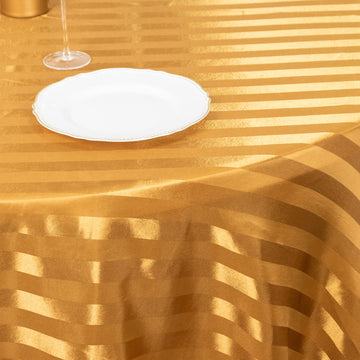 Elevate Your Event Decor with the Gold Satin Stripe Seamless Round Tablecloth 120