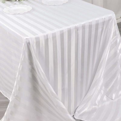 Striped white tablecloth draped elegantly over a table.