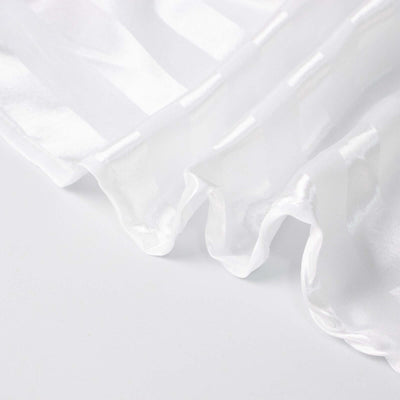 White satin fabric with a smooth, shiny texture