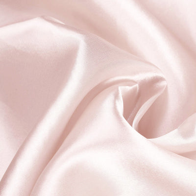 Soft pink satin fabric with a smooth, luxurious texture.