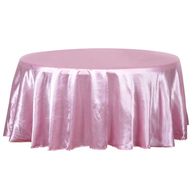 Pink satin tablecloth with elegant draping.