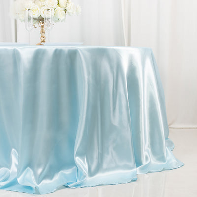 Satin blue tablecloth draped elegantly over a table