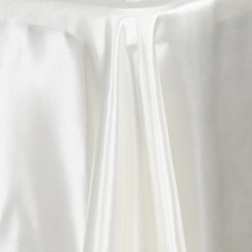 Create a Memorable Event with Our Ivory Satin Seamless Smooth Satin Tablecloth