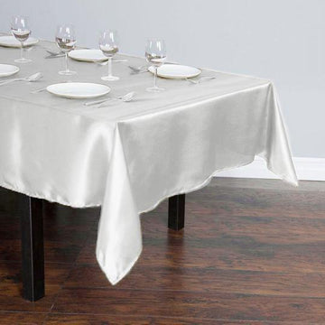 Elevate Your Event with the Ivory Seamless Smooth Satin Rectangular Tablecloth
