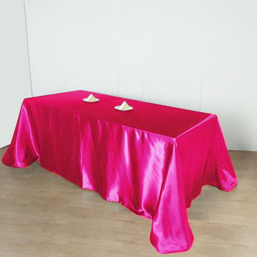 Elevate Your Event with the Fuchsia Seamless Satin Rectangular Tablecloth