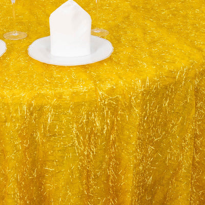 Yellow textured tablecloth with white plate and napkin set.