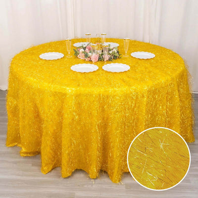Yellow decorative tablecloth with shimmering texture on a round table.