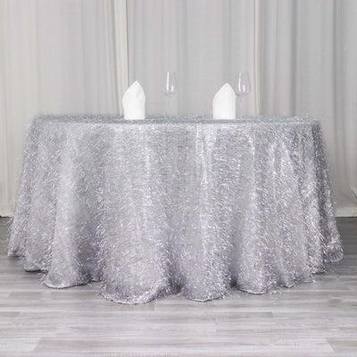 Silver tablecloth with textured finish, elegantly draped on a table.