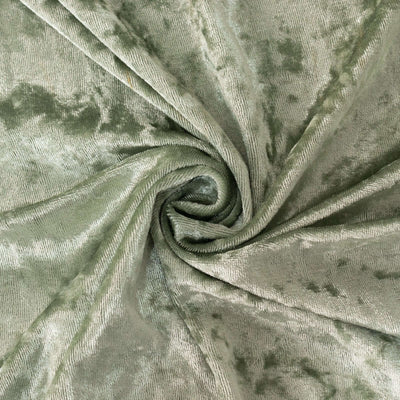 Green velvet fabric with a soft texture and sheen.