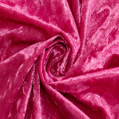 Pink velvet fabric showcasing soft texture and rich color.