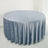 Round blue velvet tablecloth with elegant draping.