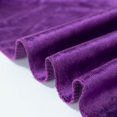 Purple folded fabric close-up with textured edges