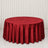 Red velvet round tablecloth on elegant banquet table
