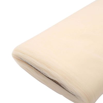 Beige tulle fabric roll for sewing and crafting projects