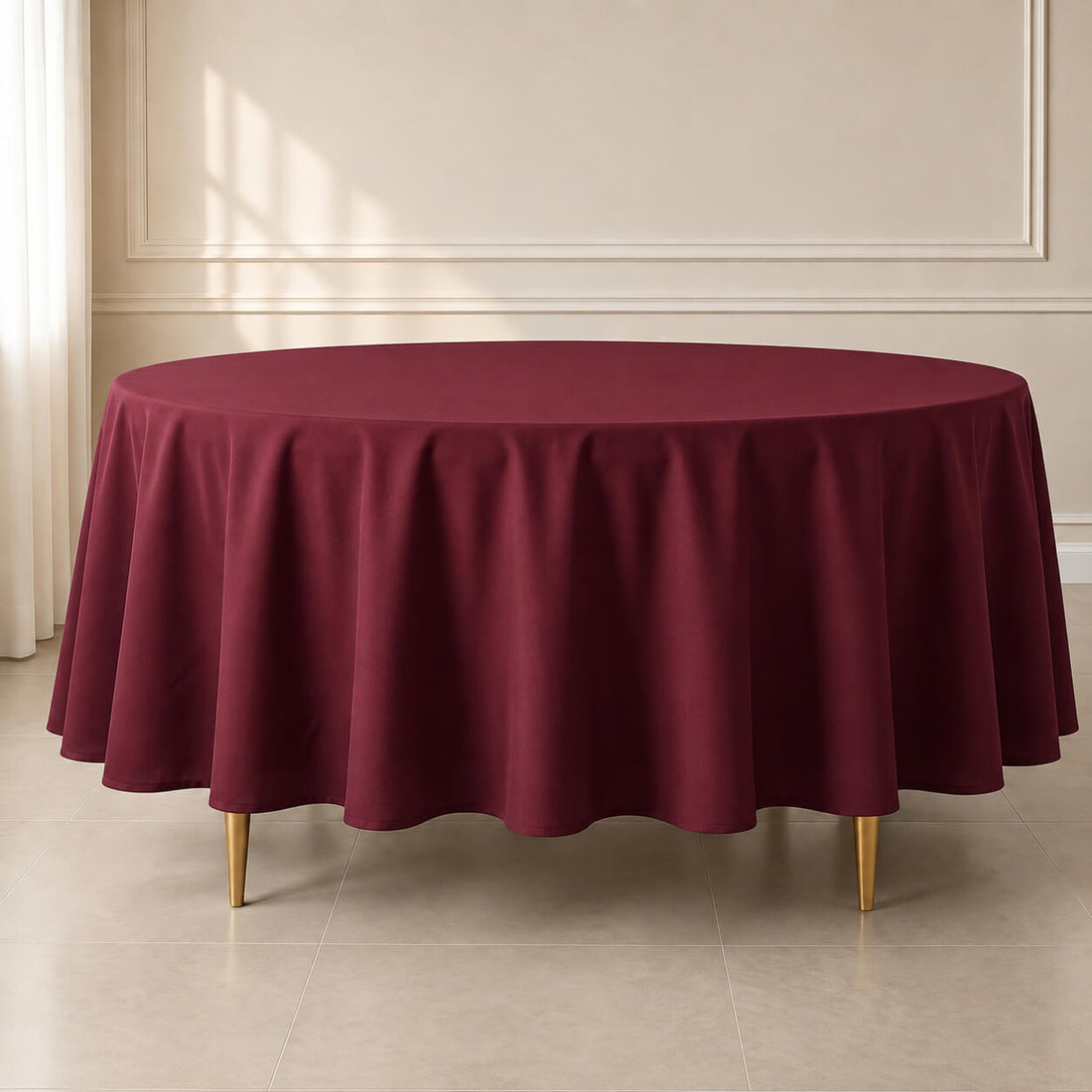 Burgundy round tablecloth 108" - durable and stain-resistant for easy maintenance.