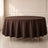Chocolate round tablecloth on a table with gold legs.