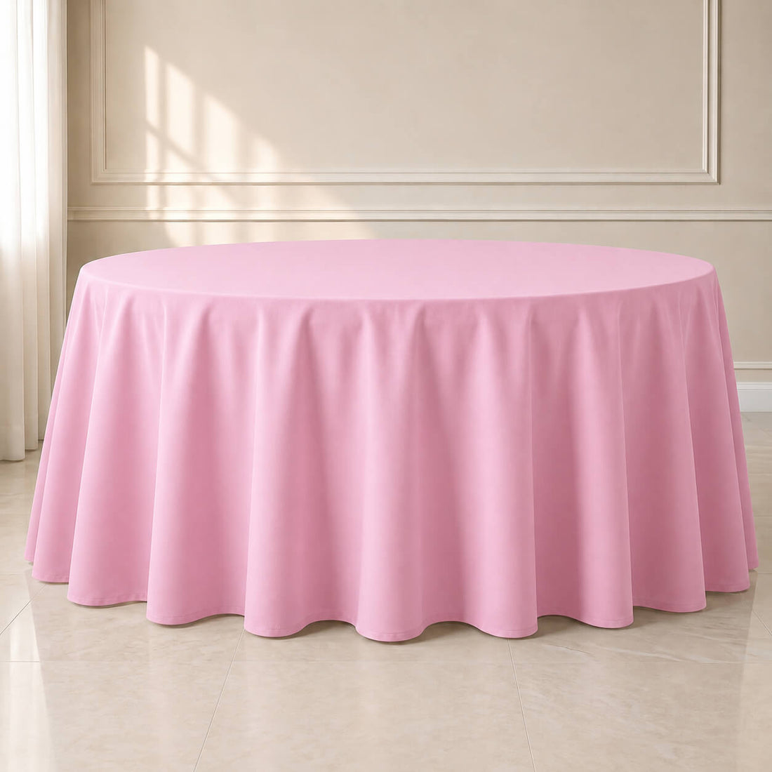 Pink polyester round tablecloth, 120 inches, durable and seamless design.