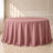 Dusty rose seamless round tablecloth on a light background.