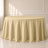 Champagne polyester round tablecloth with seamless finish.