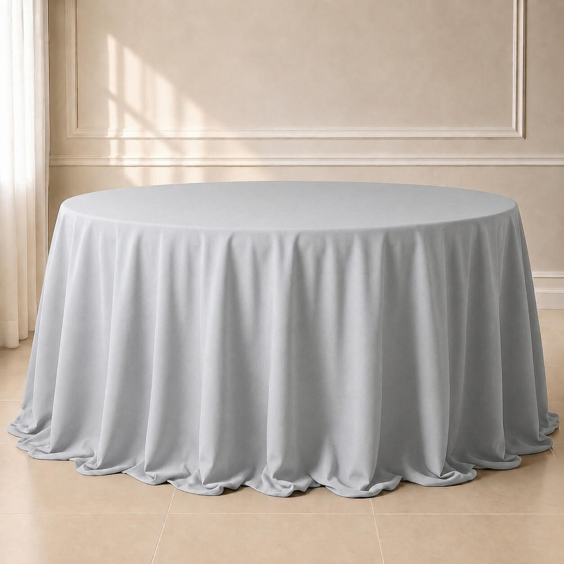 Silver polyester round tablecloth, seamless finish, 132 inches.