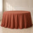 Terracotta round tablecloth with seamless finish on a round table.