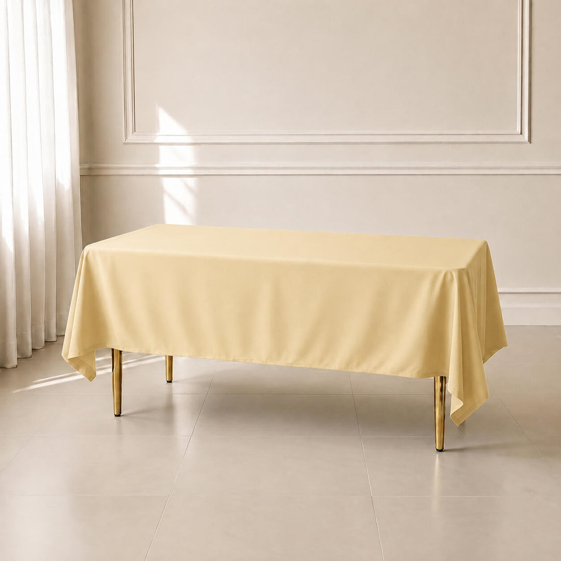 Beige wrinkle-resistant polyester tablecloth on a dining table.