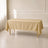 Champagne rectangle tablecloth 60"x102" on a table in a bright room.