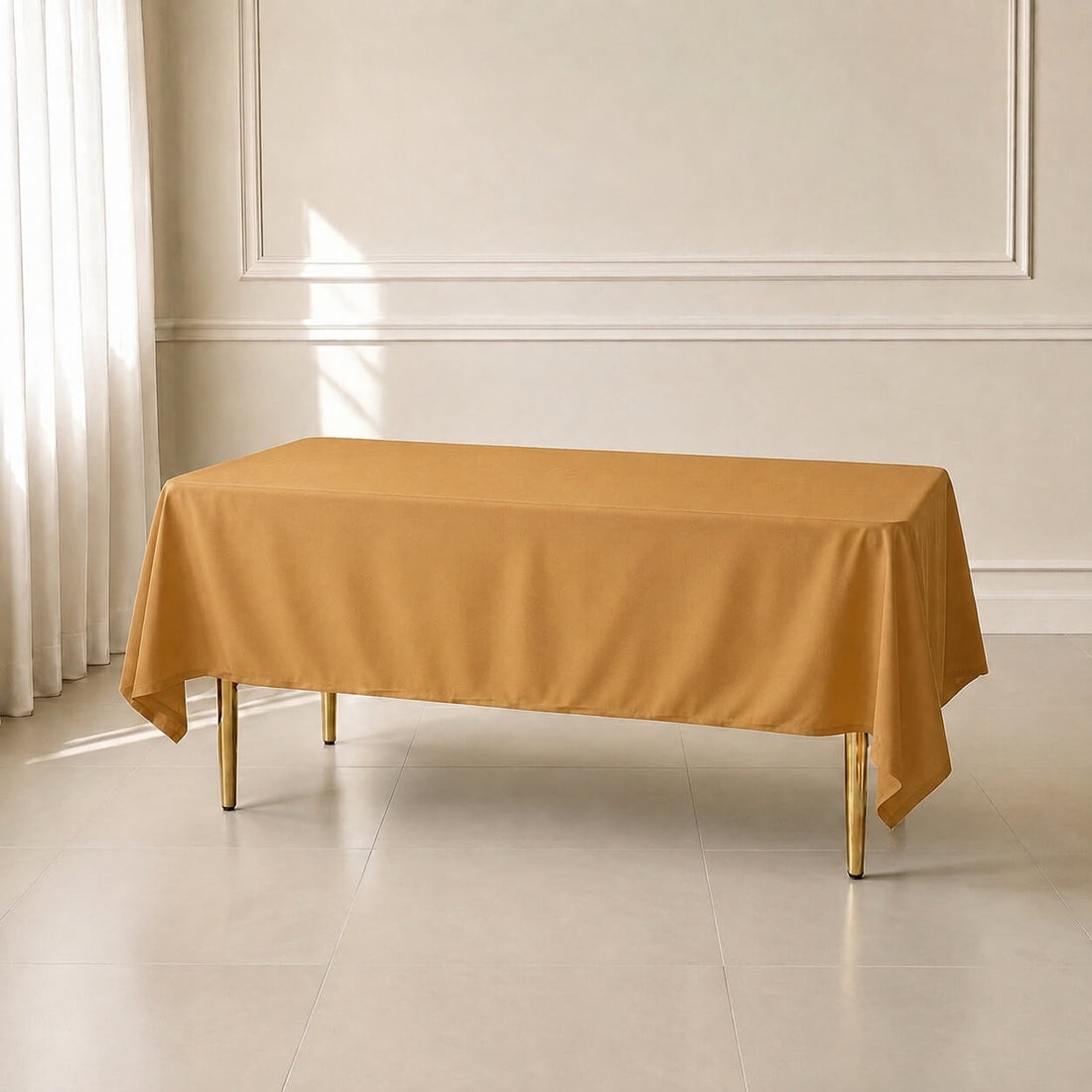 Gold rectangle tablecloth 60"x102" with wrinkle-resistant finish on a table.