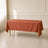 Terracotta rectangle tablecloth 60"x102" with wrinkle-resistant finish.