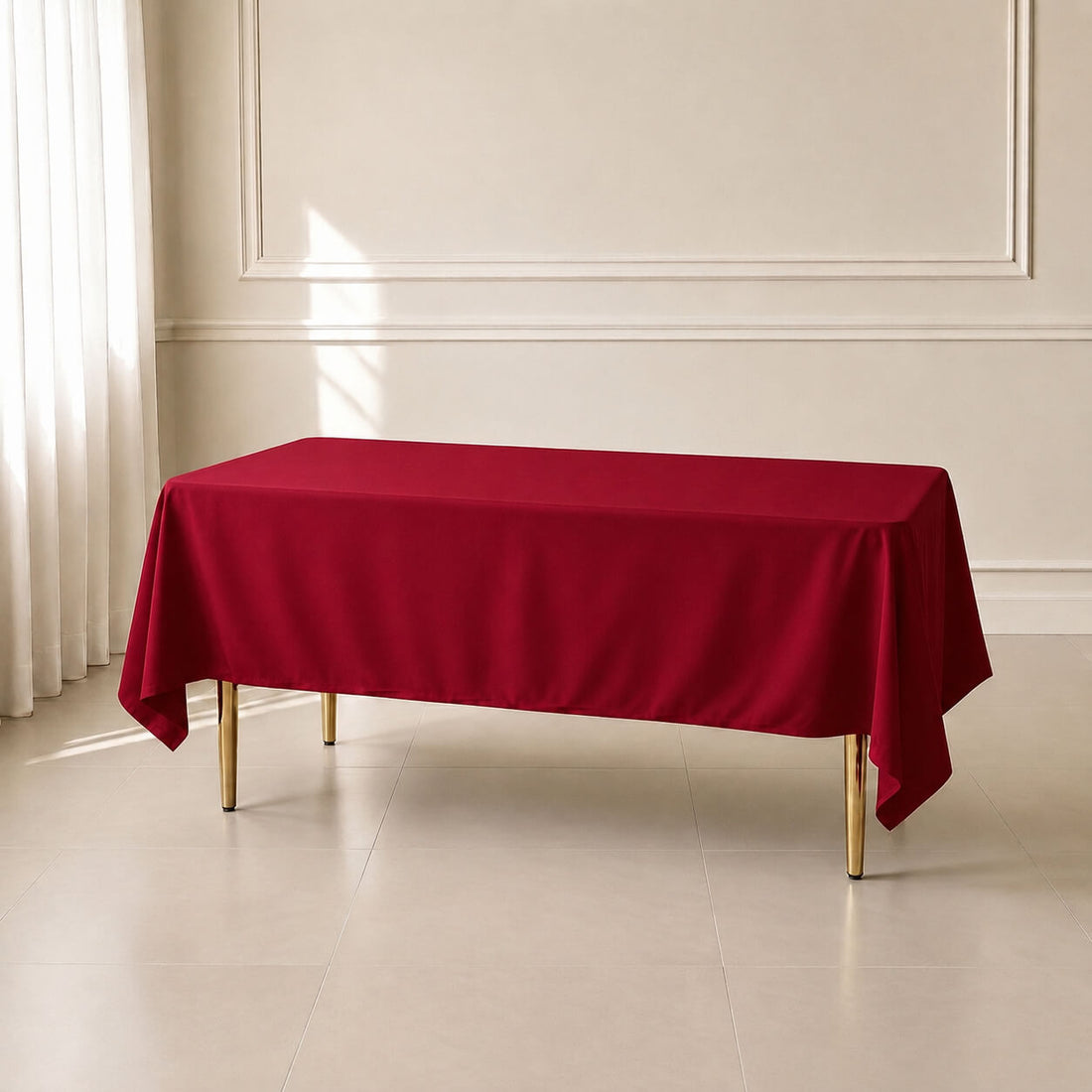 Wine polyester rectangle tablecloth 60"x102" on a table.